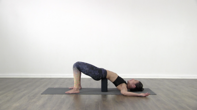 Yogi is practising yoga on a blue yoga mat on white background