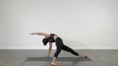 Yogi is practising yoga on a blue yoga mat on white background