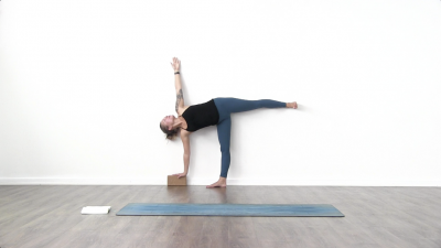 Yogi is practising yoga on a blue yoga mat on white background