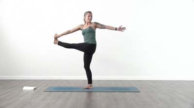 Yogi is practising yoga on a blue yoga mat on white background