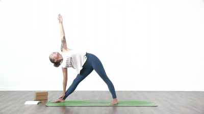 Yogi is practising yoga on a blue yoga mat on white background