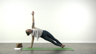 Yogi is practising yoga on a blue yoga mat on white background