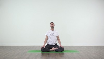 Yoga practice at Yogateket with Guy Powiecki sitting in Padmasana