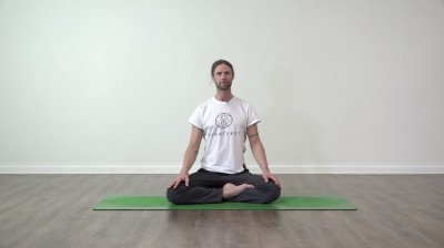 Yoga practice at Yogateket with Guy Powiecki sitting in Padmasana