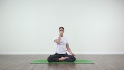 Yoga practice at Yogateket with Guy Powiecki sitting in Padmasana